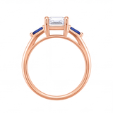 Valencia emerald cut diamond engagement ring with blue sapphire side stones by Tiani Jewellery shown in rose gold, white gold and yellow gold.