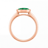 Arianwen green oval gemstone bezel engagement ring by Tiani Jewellery in rose gold, white gold and yellow gold.