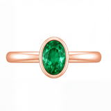 Arianwen green oval gemstone bezel engagement ring by Tiani Jewellery in rose gold, white gold and yellow gold.