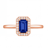 Nadine emerald cut blue sapphire halo engagement ring by Tiani Jewellery shown in rose gold, white gold and yellow gold.