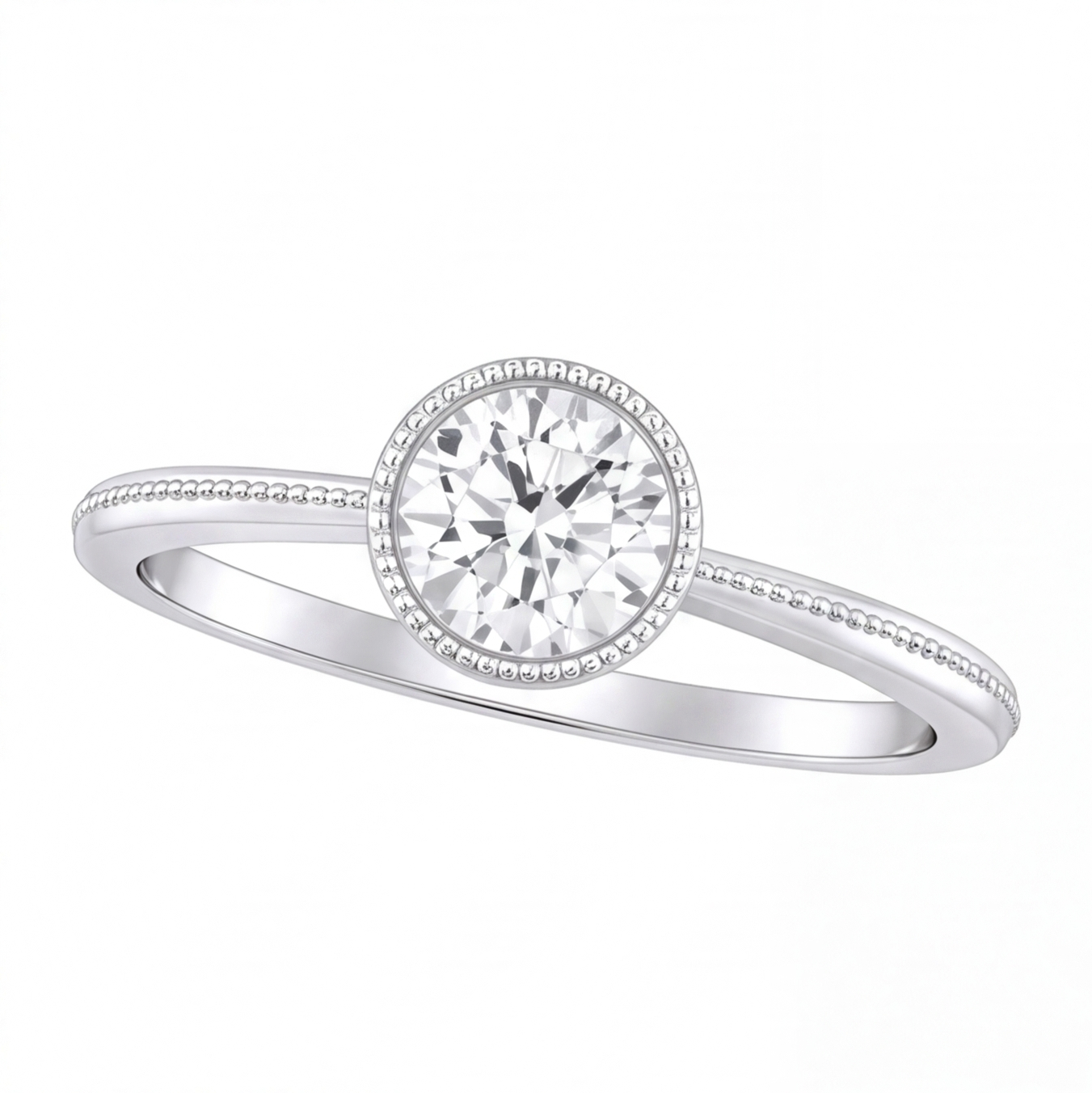 Ondine round bezel diamond milgrain engagement ring by Tiani Jewellery shown in rose gold, white gold and yellow gold.