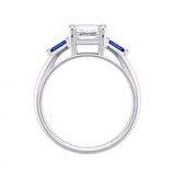 Valencia emerald cut diamond engagement ring with blue sapphire side stones by Tiani Jewellery shown in rose gold, white gold and yellow gold.