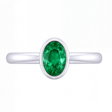 Arianwen green oval gemstone bezel engagement ring by Tiani Jewellery in rose gold, white gold and yellow gold.