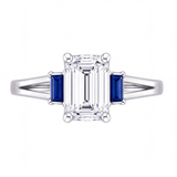 Valencia emerald cut diamond engagement ring with blue sapphire side stones by Tiani Jewellery shown in rose gold, white gold and yellow gold.