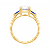 Valencia emerald cut diamond engagement ring with blue sapphire side stones by Tiani Jewellery shown in rose gold, white gold and yellow gold.