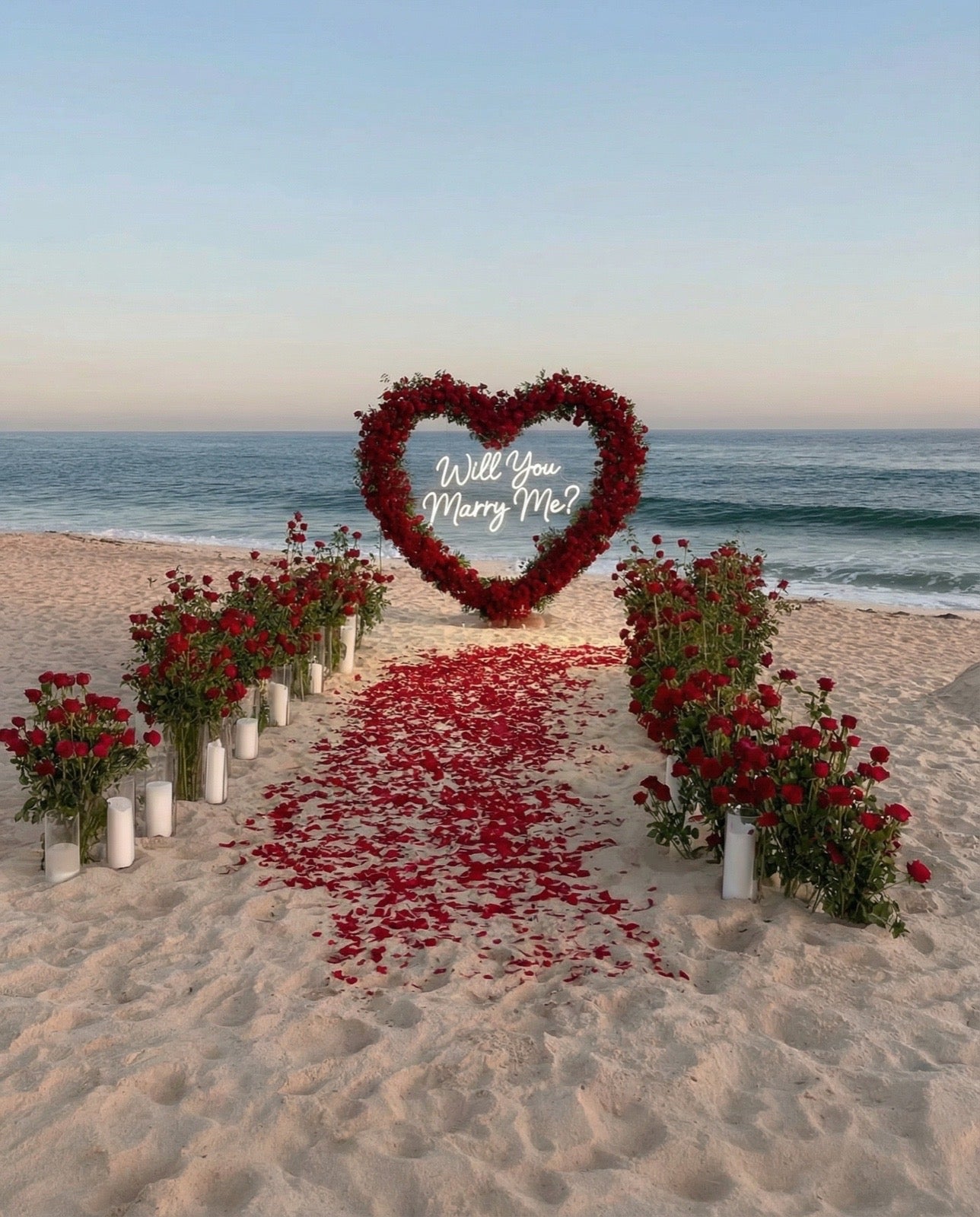 Tiani Exquisite luxury heart and rose proposal experience by Tiani Jewellery featuring a heart-shaped rose arrangement and romantic candlelit styling.